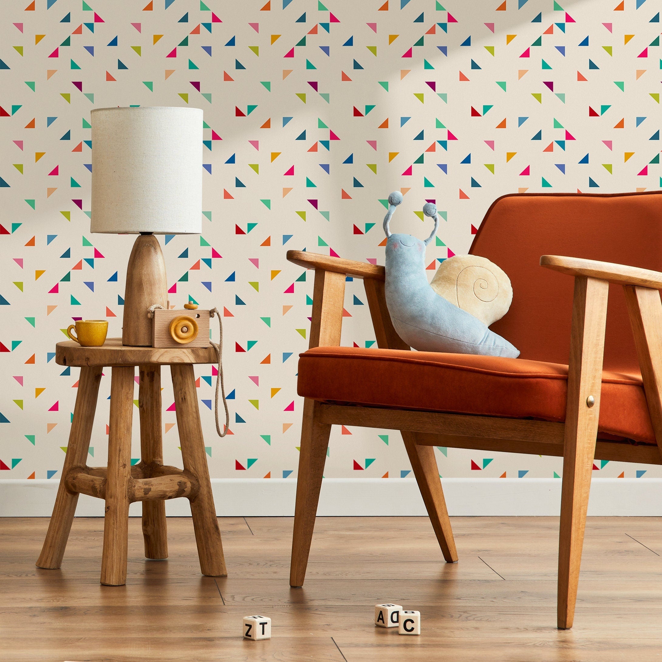 Geometric Wallpaper with Colorful Scattered Triangles in Blue, Pink, and Green - B292