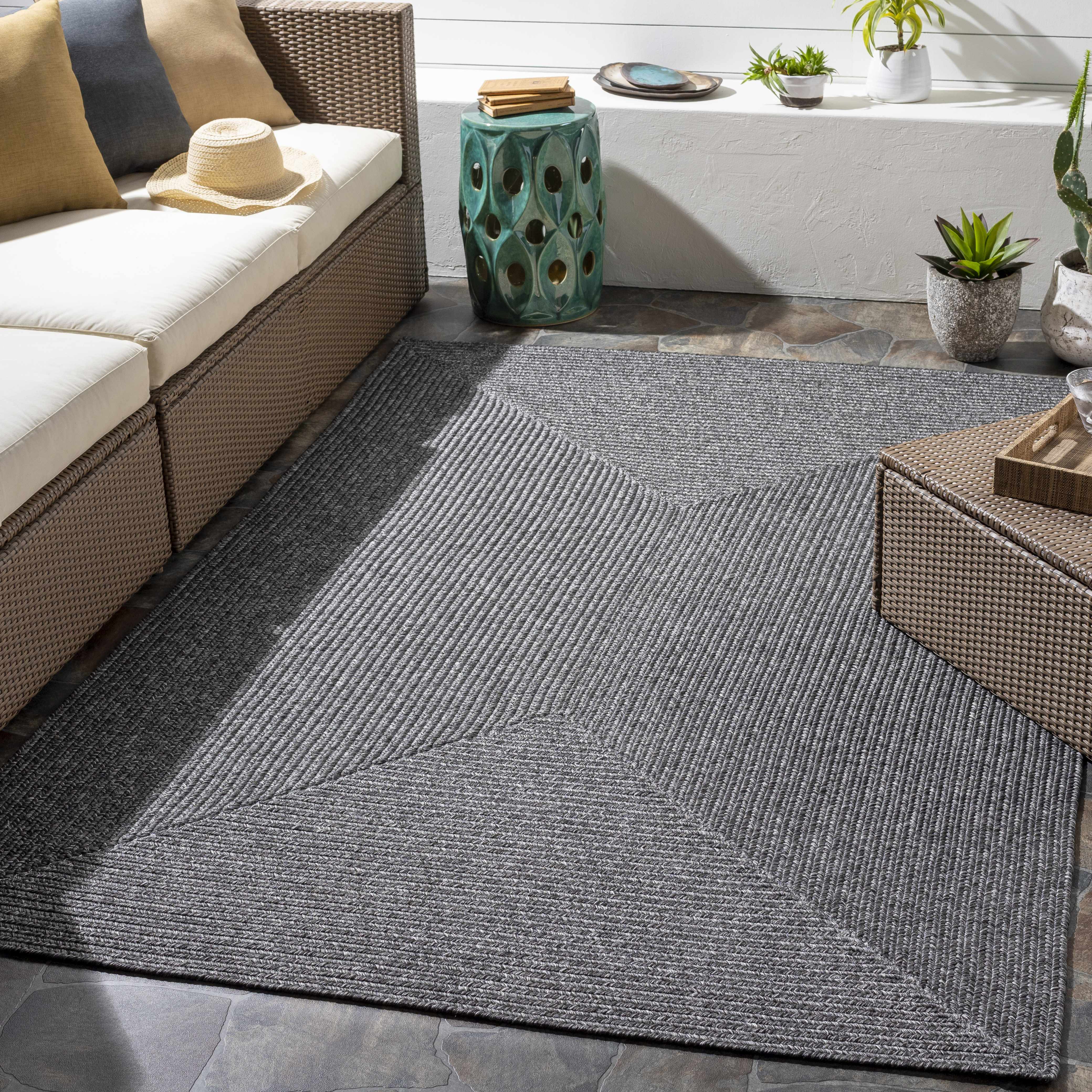 Alfombra trenzada de yute sintético de color negro