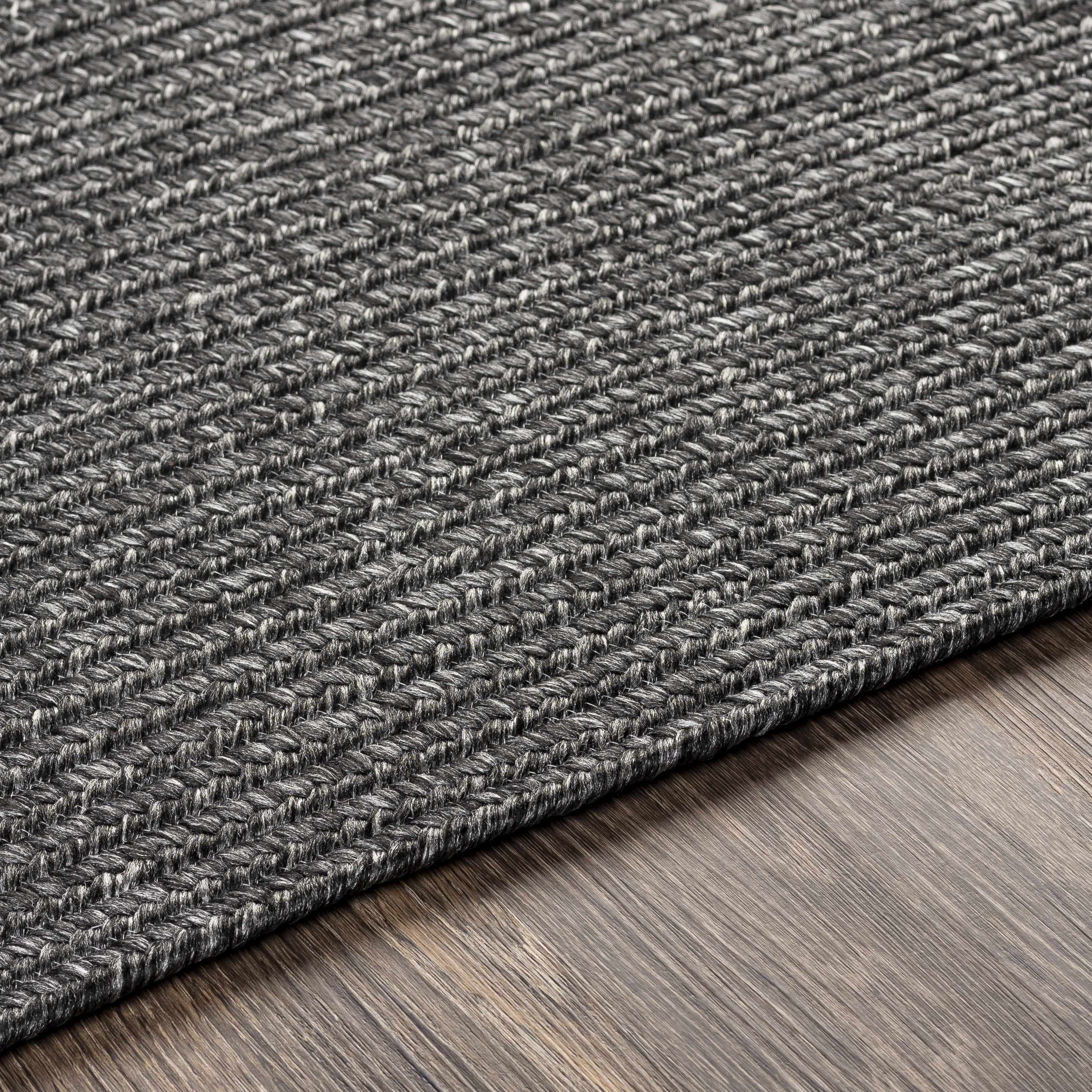 Alfombra trenzada de yute sintético de color negro