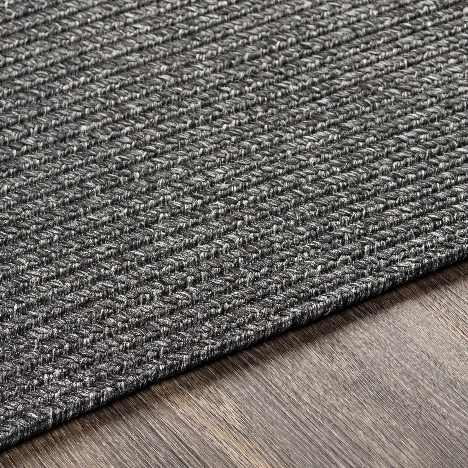 Alfombra trenzada de yute sintético de color negro
