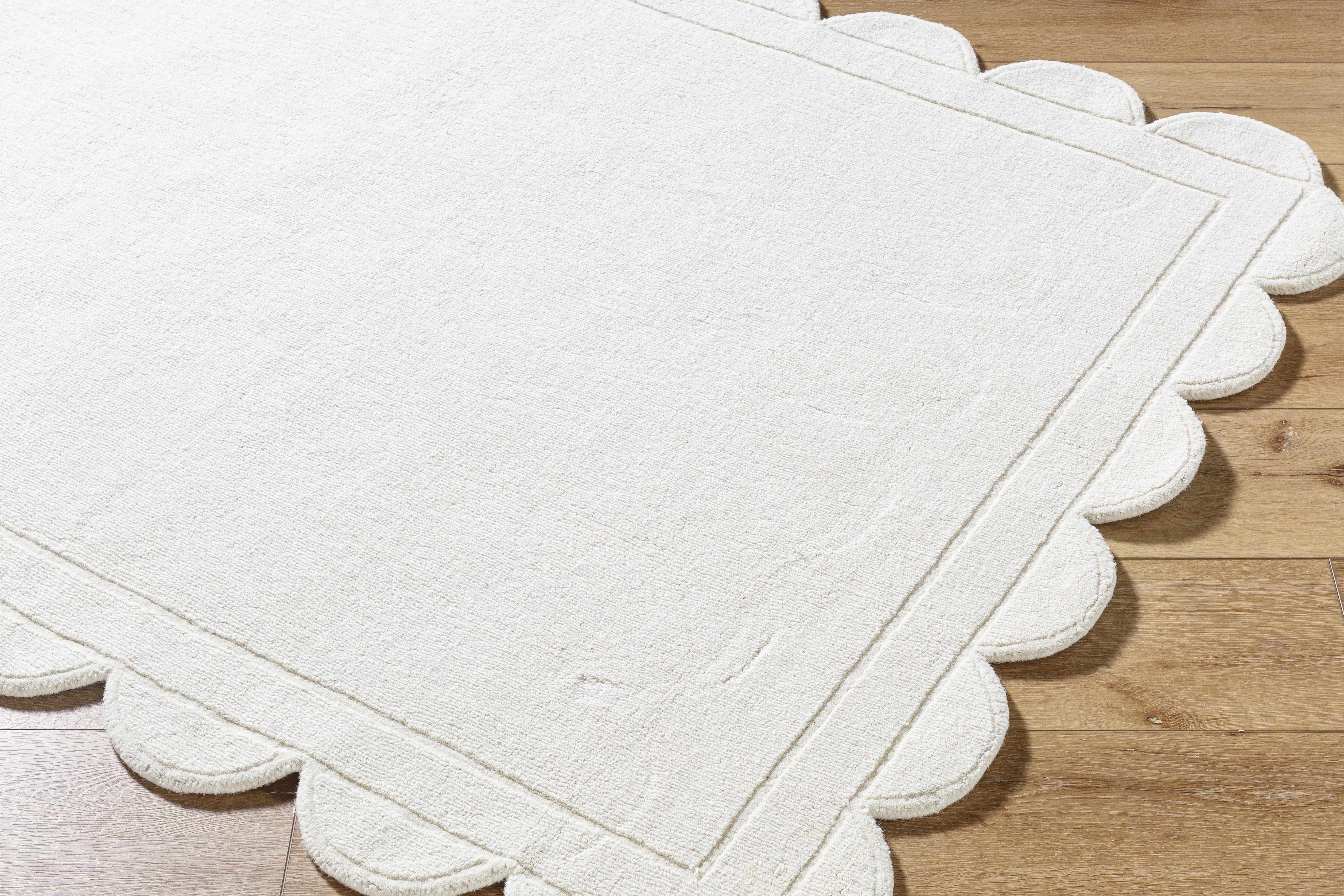Uhuro White Geometric Area Rug