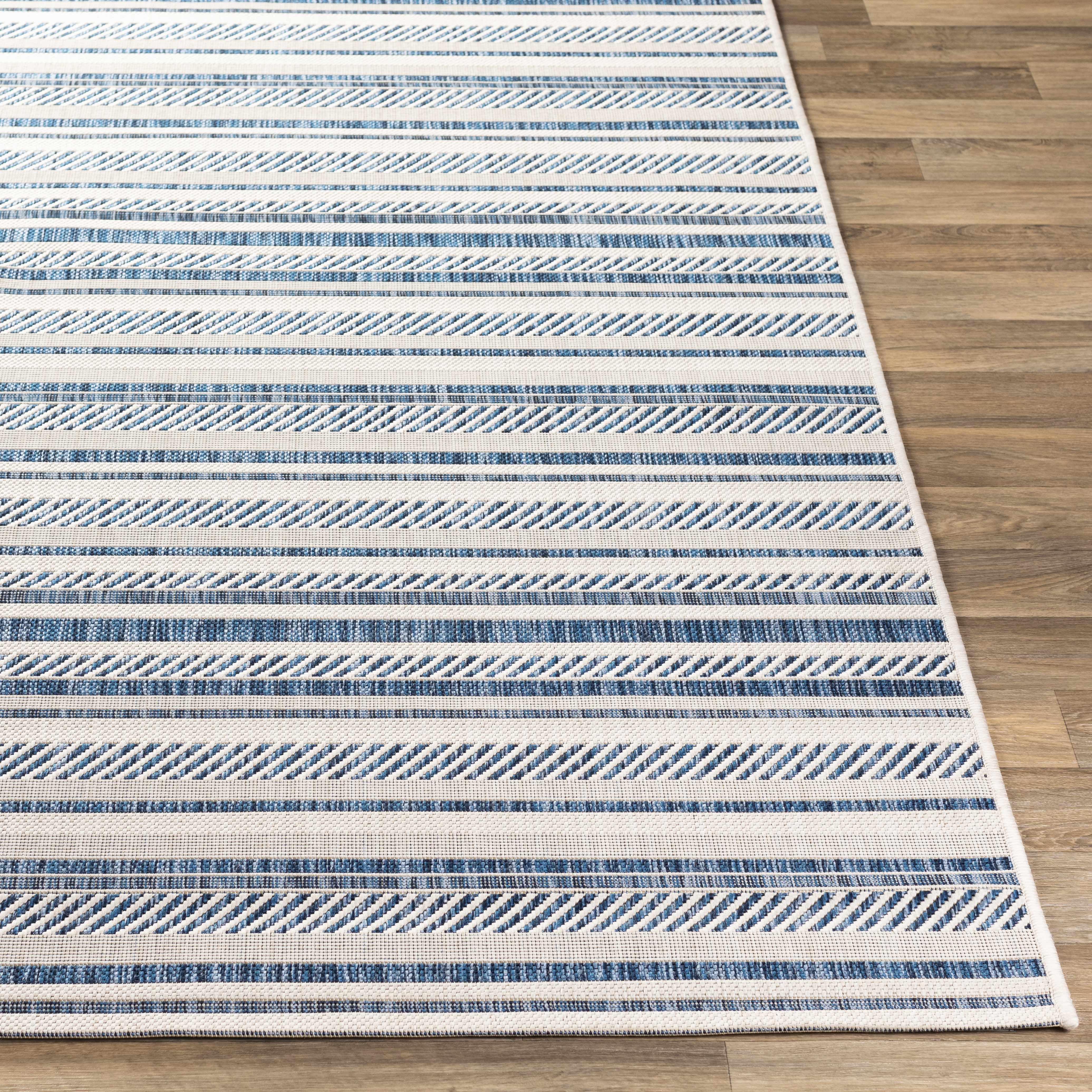 Alfombra nórdica de rayas blancas y azules Olin