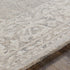 Roessleville Cream Wool Area Rug