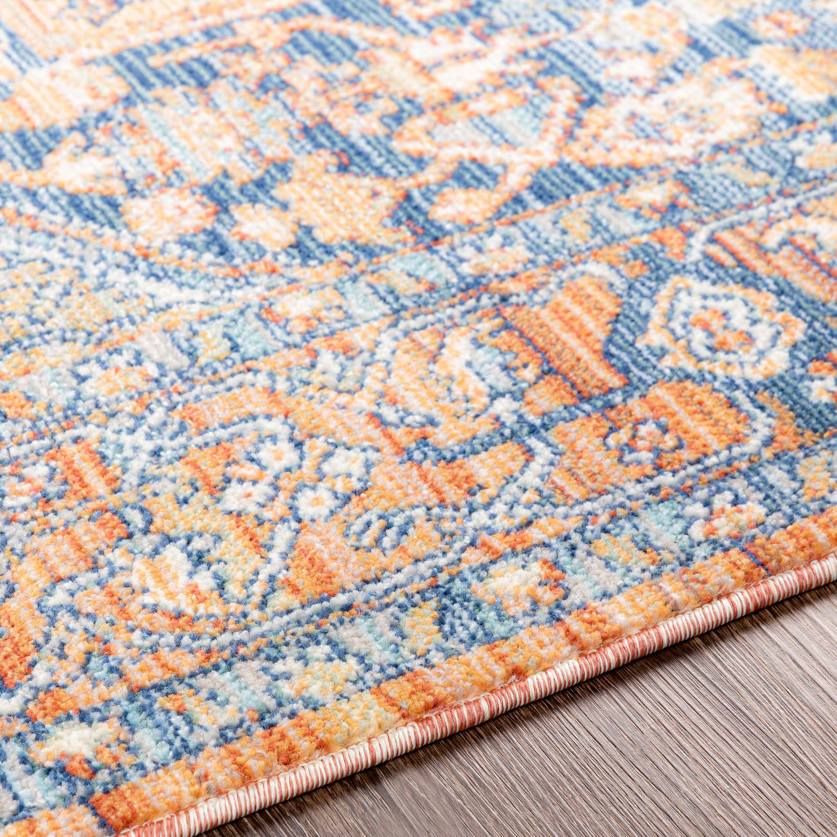 Alfombra con medallón azul y naranja de Ripponlea