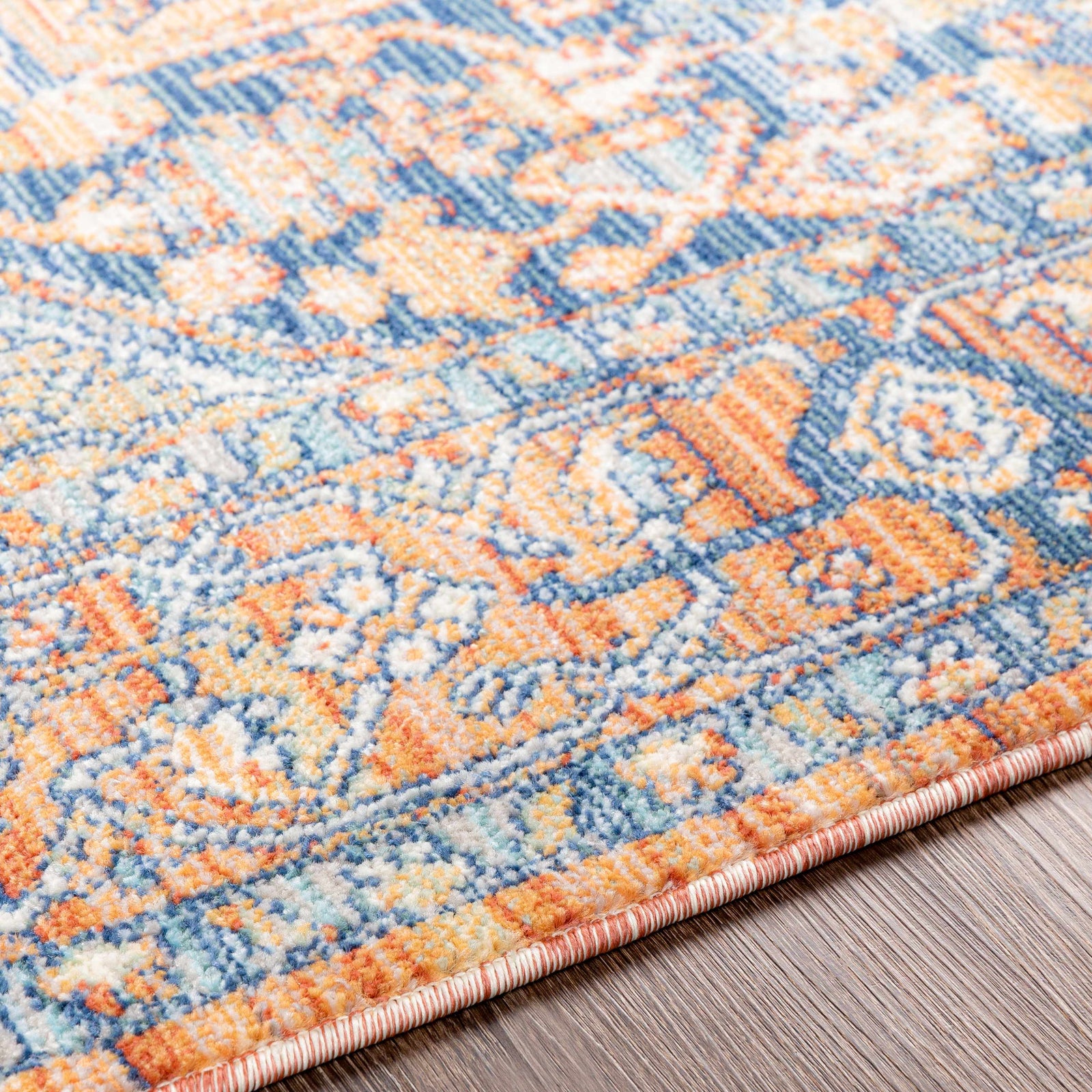 Alfombra con medallón azul y naranja de Ripponlea