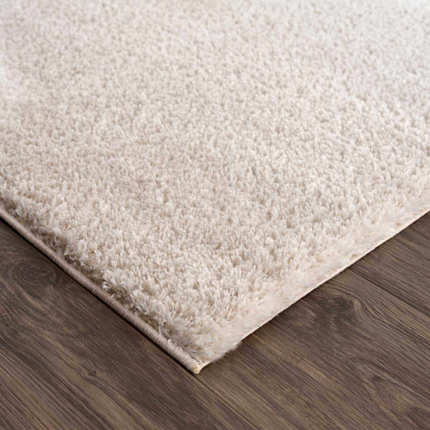 Alfombra de felpa sólida color beige celestial