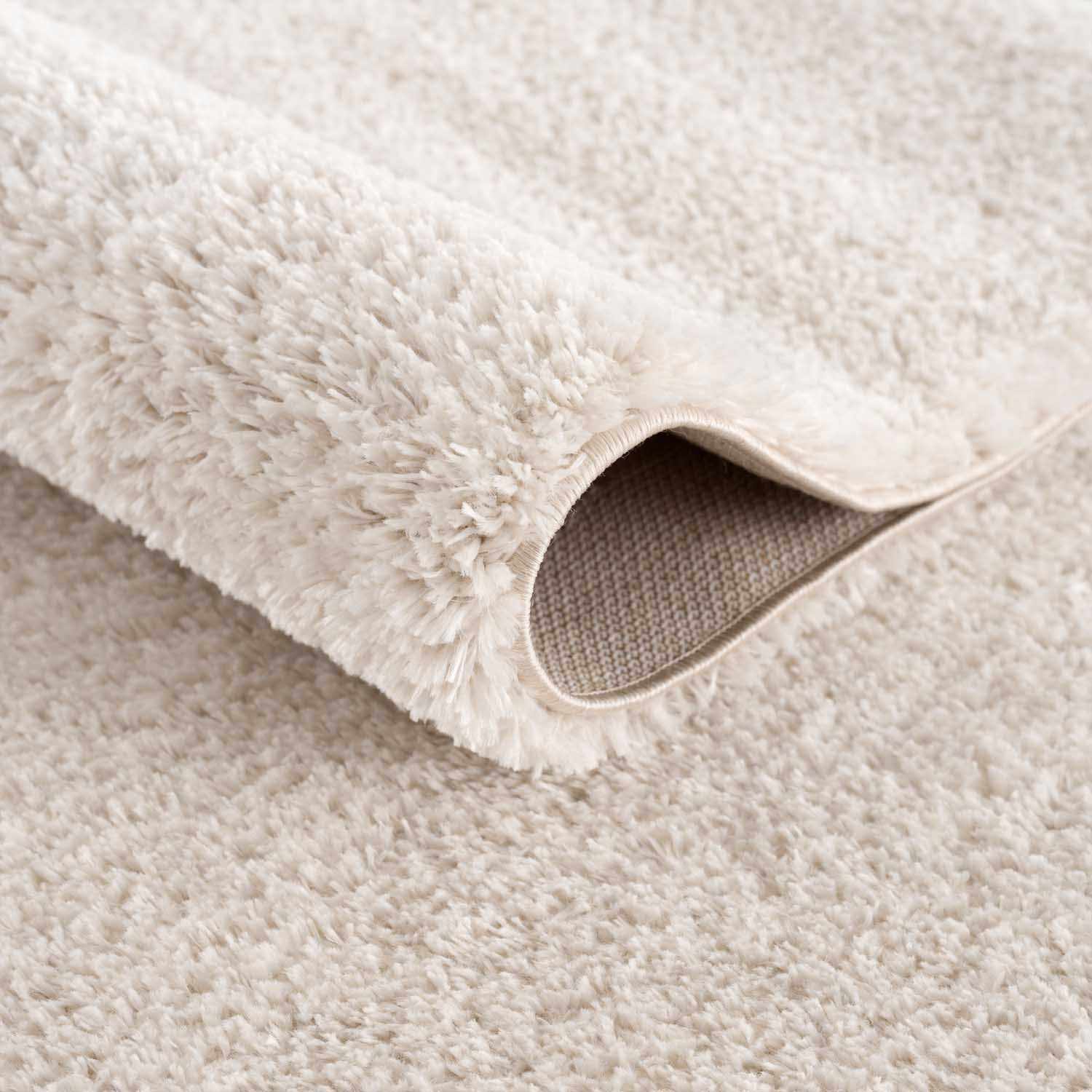 Alfombra de felpa sólida color beige celestial