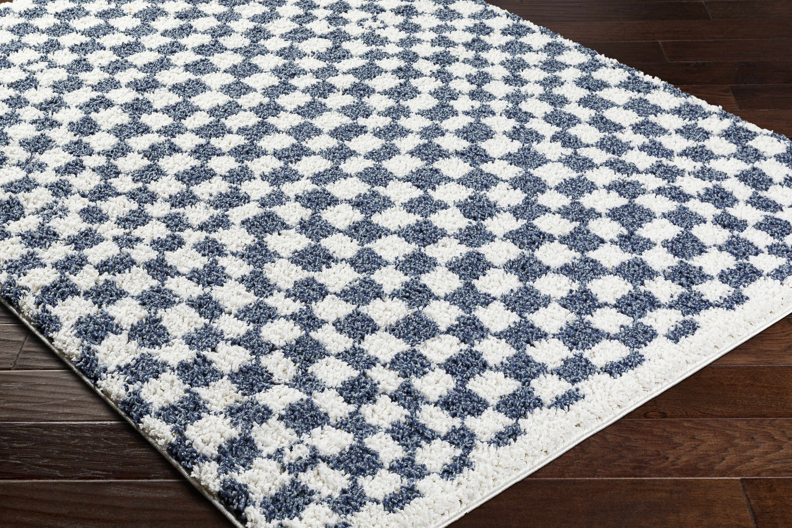 Alfombra de cuadros blancos y azules de Kieu
