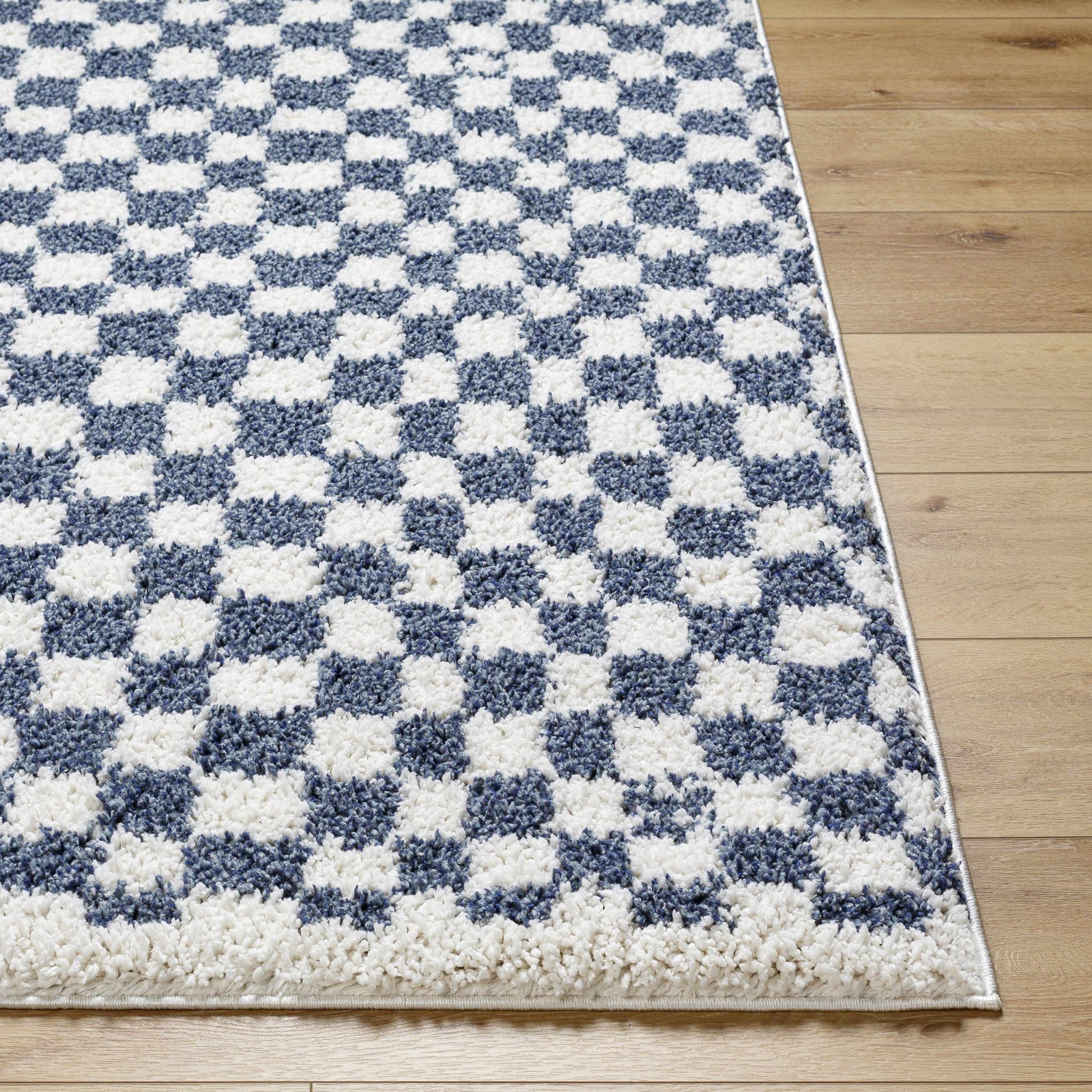 Alfombra de cuadros blancos y azules de Kieu