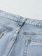Stylish Ripped Denim Shorts with Tassels