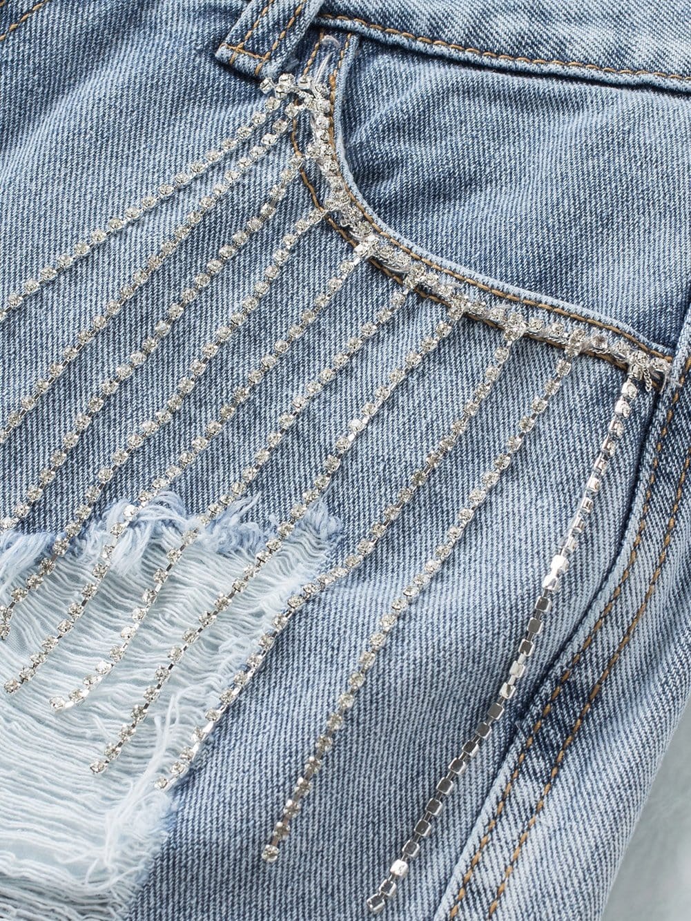 Stylish Ripped Denim Shorts with Tassels