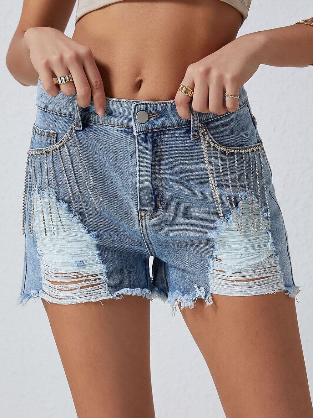 Stylish Ripped Denim Shorts with Tassels