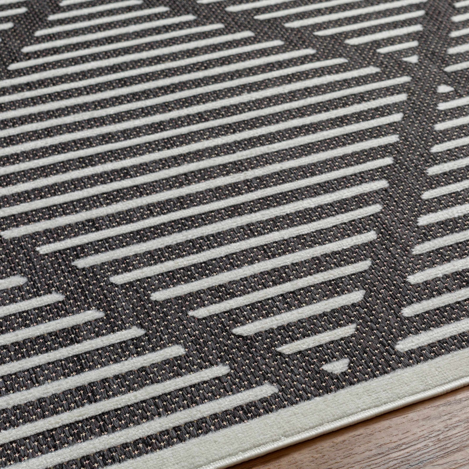 Alfombra duradera negra Anah