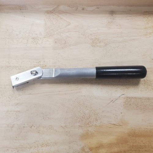 Raspador de mano con cabezal pivotante