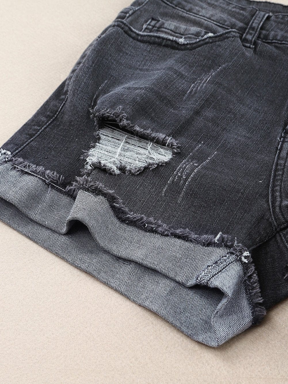 Vintage Chic Distressed Black Denim Shorts with Roll Hem