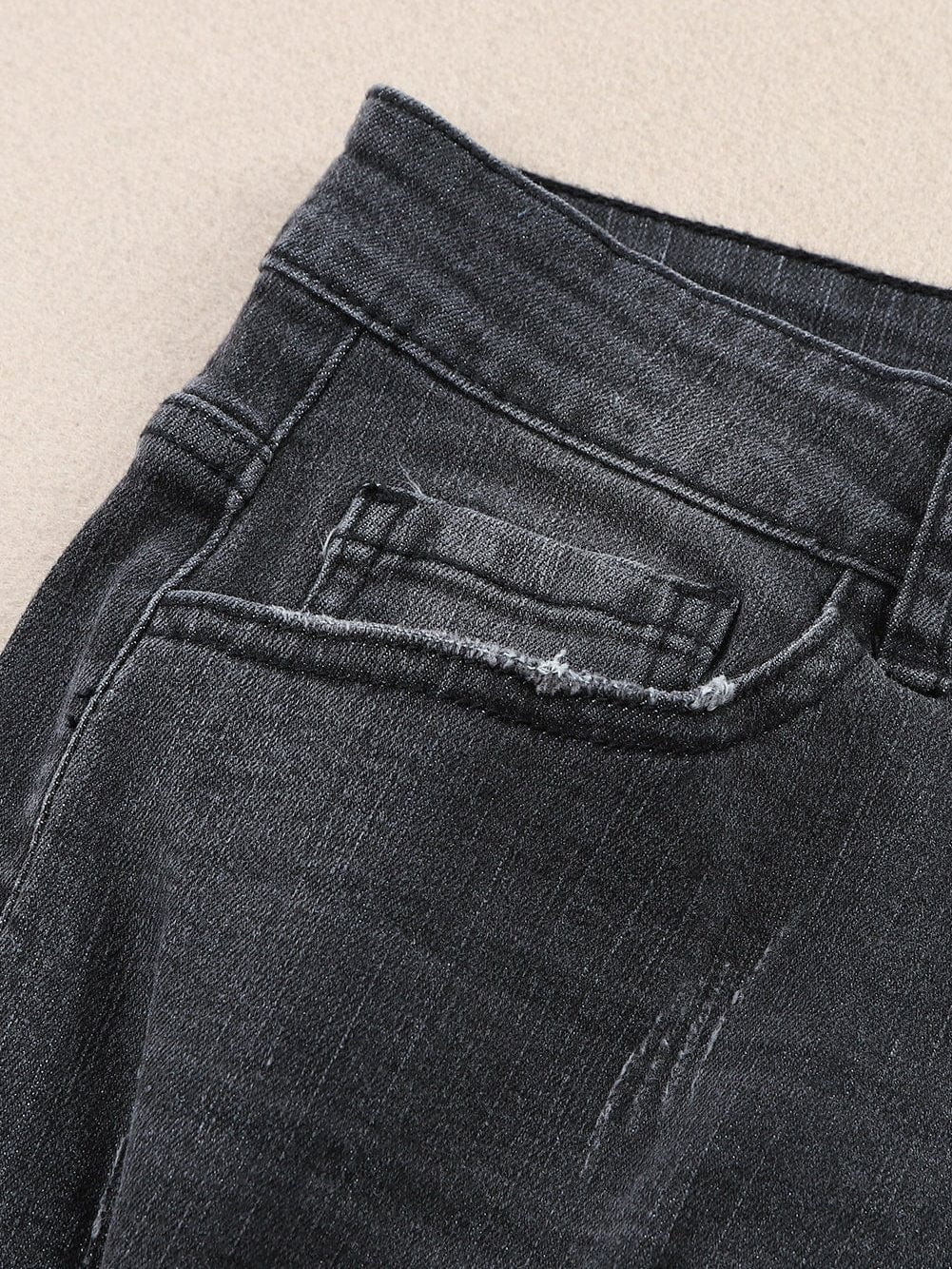 Vintage Chic Distressed Black Denim Shorts with Roll Hem