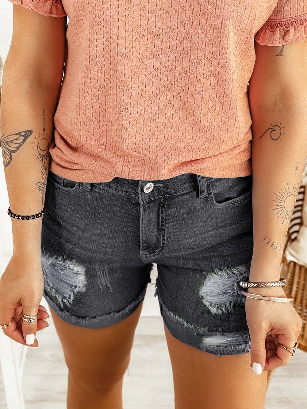 Vintage Chic Distressed Black Denim Shorts with Roll Hem