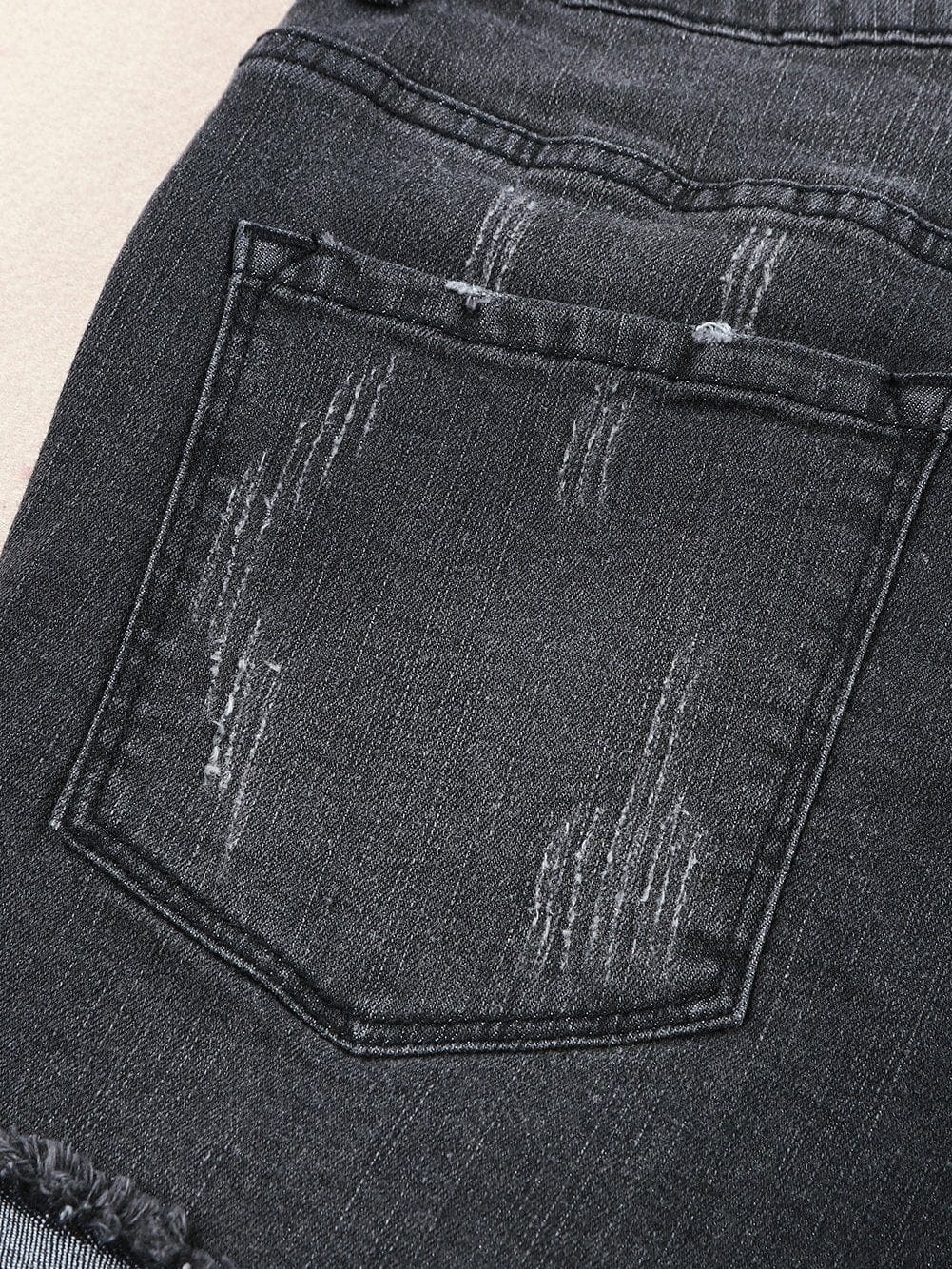 Vintage Chic Distressed Black Denim Shorts with Roll Hem